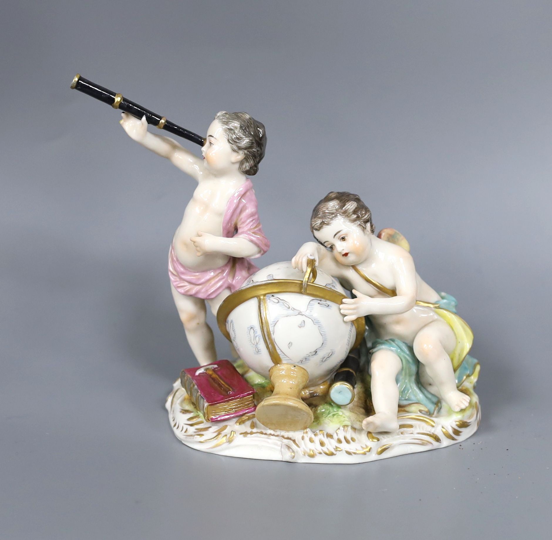 A Meissen style figure group, astrology cherubs, 12cm high